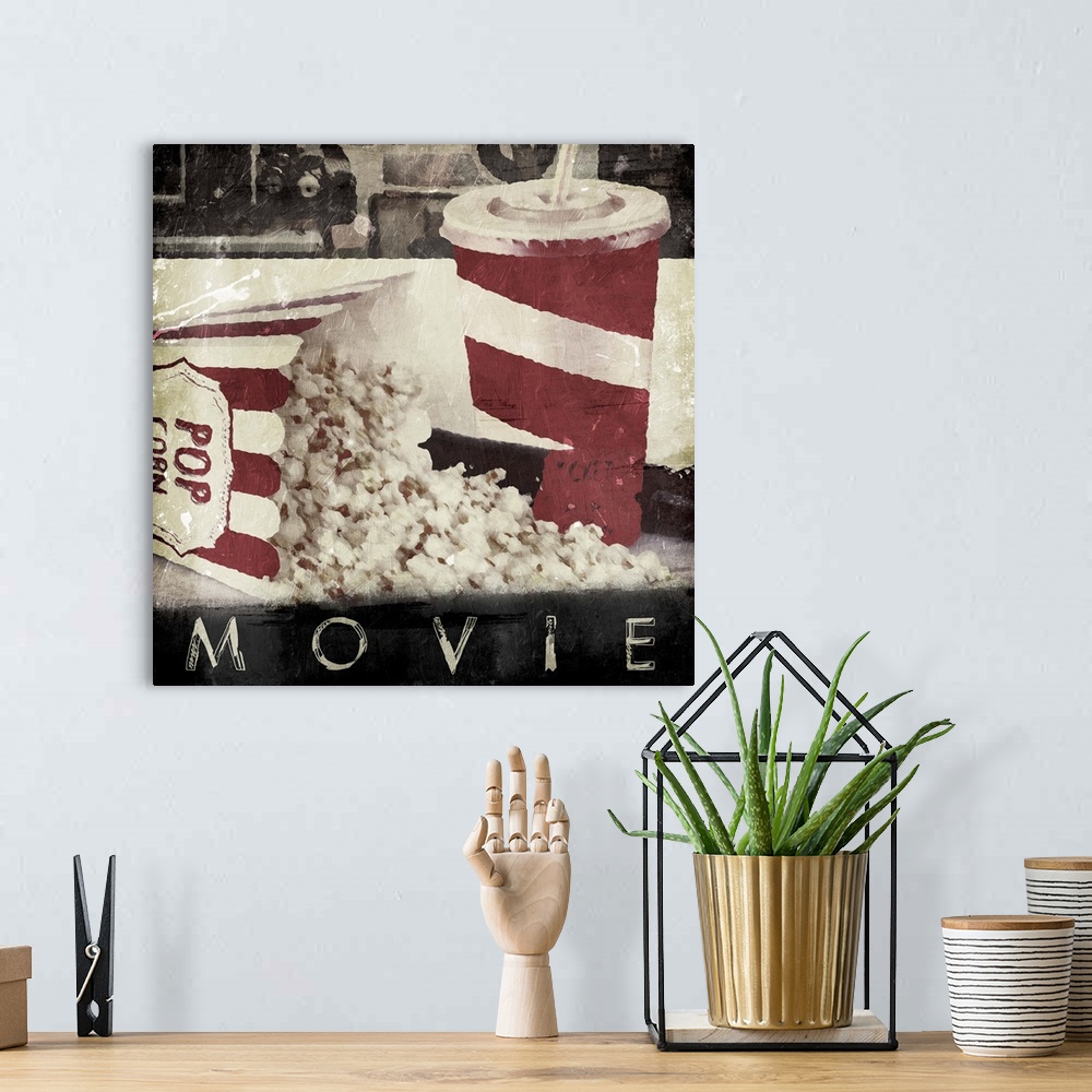 A bohemian room featuring A vintage square theater art piece with the word ?Movie? at painted the bottom.�