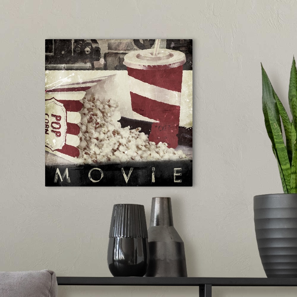 A modern room featuring A vintage square theater art piece with the word ?Movie? at painted the bottom.�