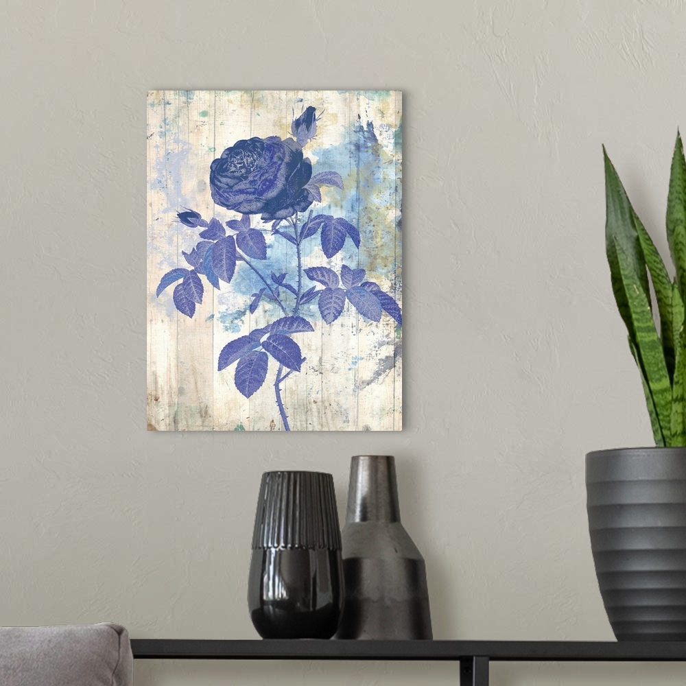 A modern room featuring Artwork of a blue flower against a weathered and washed looking background.