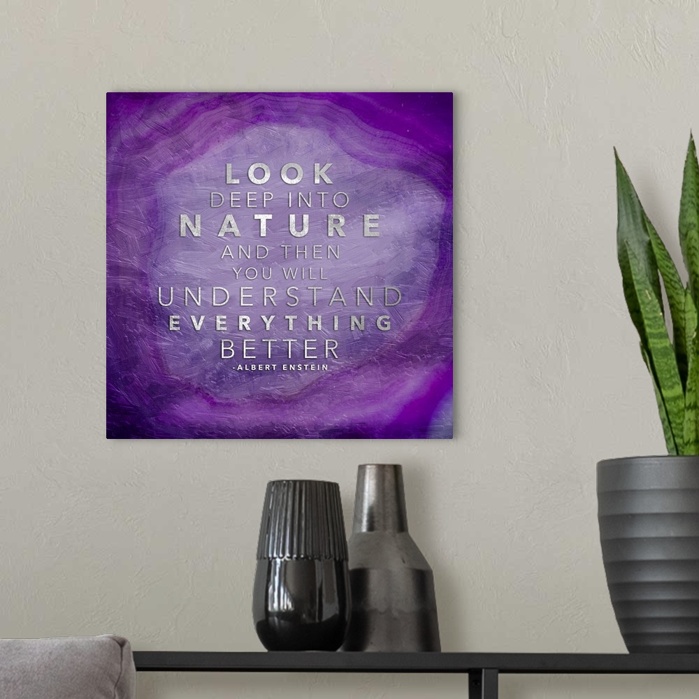 A modern room featuring A quotation in silver on a bright purple polished agate stone.