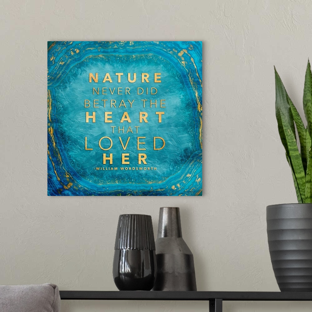 A modern room featuring A quotation in gold on a bright blue polished agate stone.