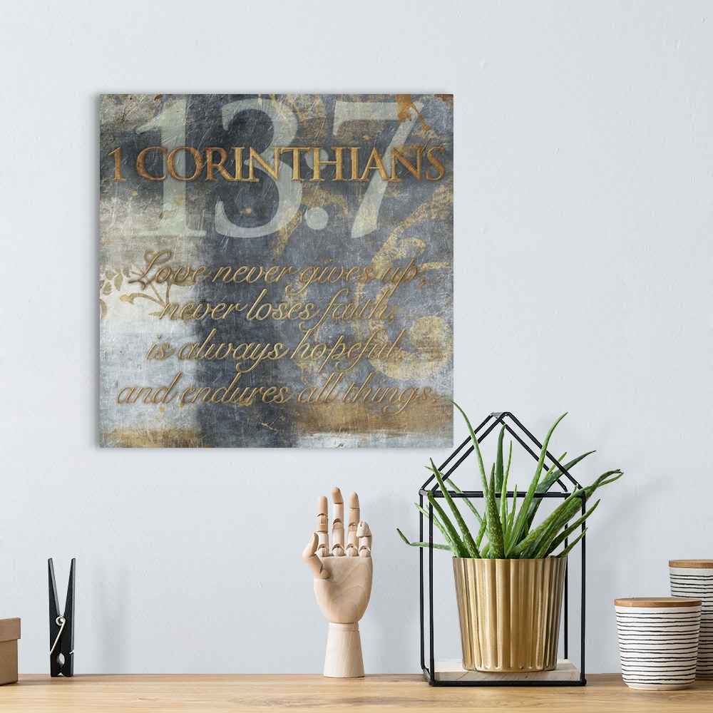 A bohemian room featuring Typography art of the Bible verse 1 Corinthians 13:7.