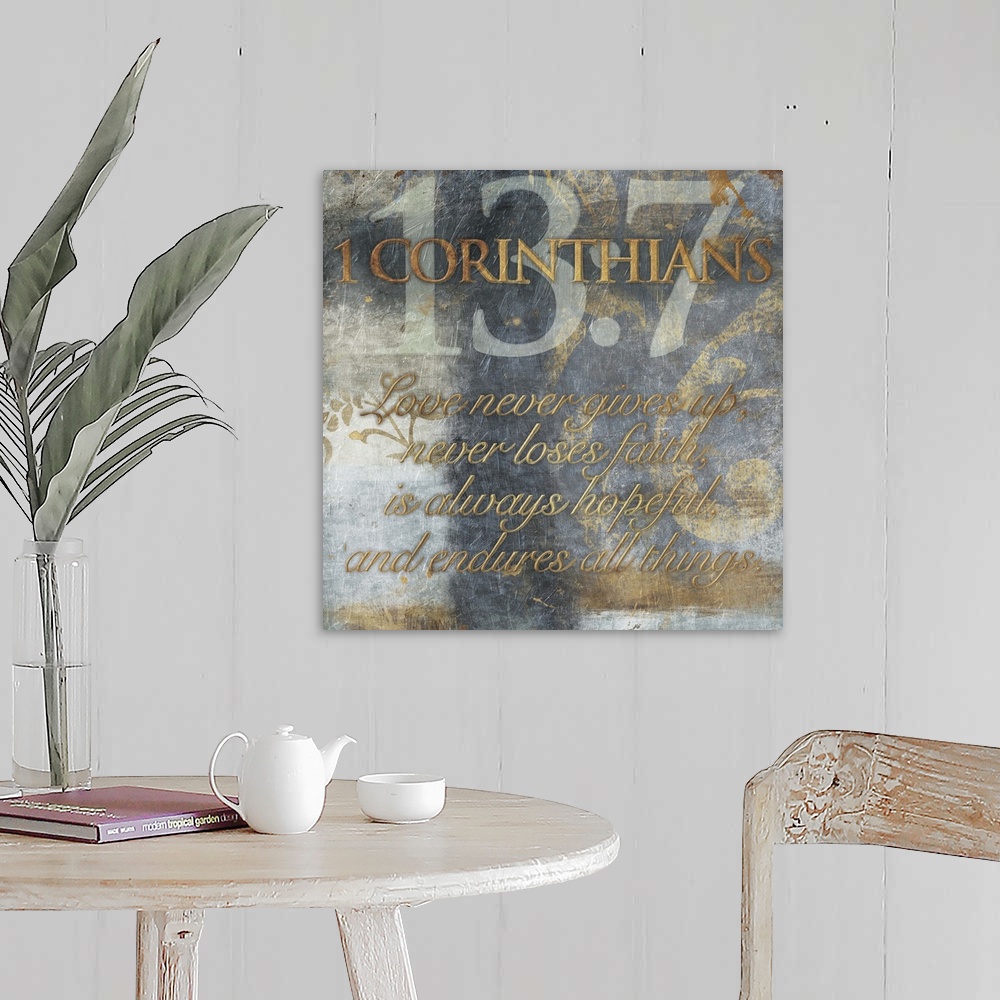 A farmhouse room featuring Typography art of the Bible verse 1 Corinthians 13:7.