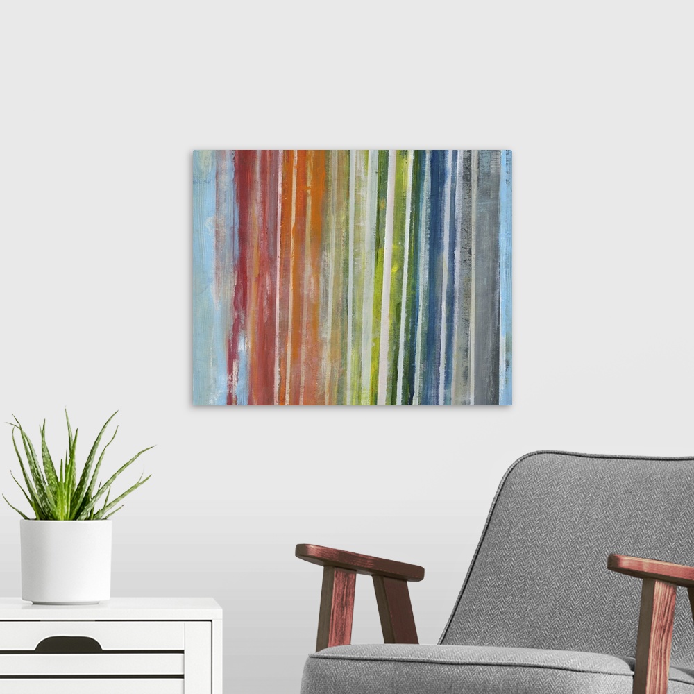 A modern room featuring Contemporary abstract artwork of vertical lines in a rainbow gradient.