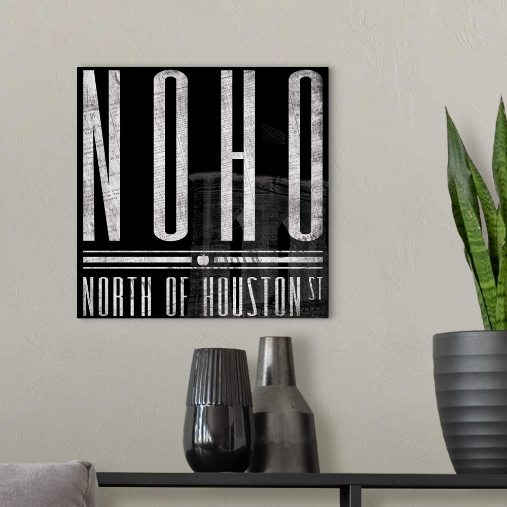 A modern room featuring Typographical artwork of New York City destination NOHO against a black background, with building.