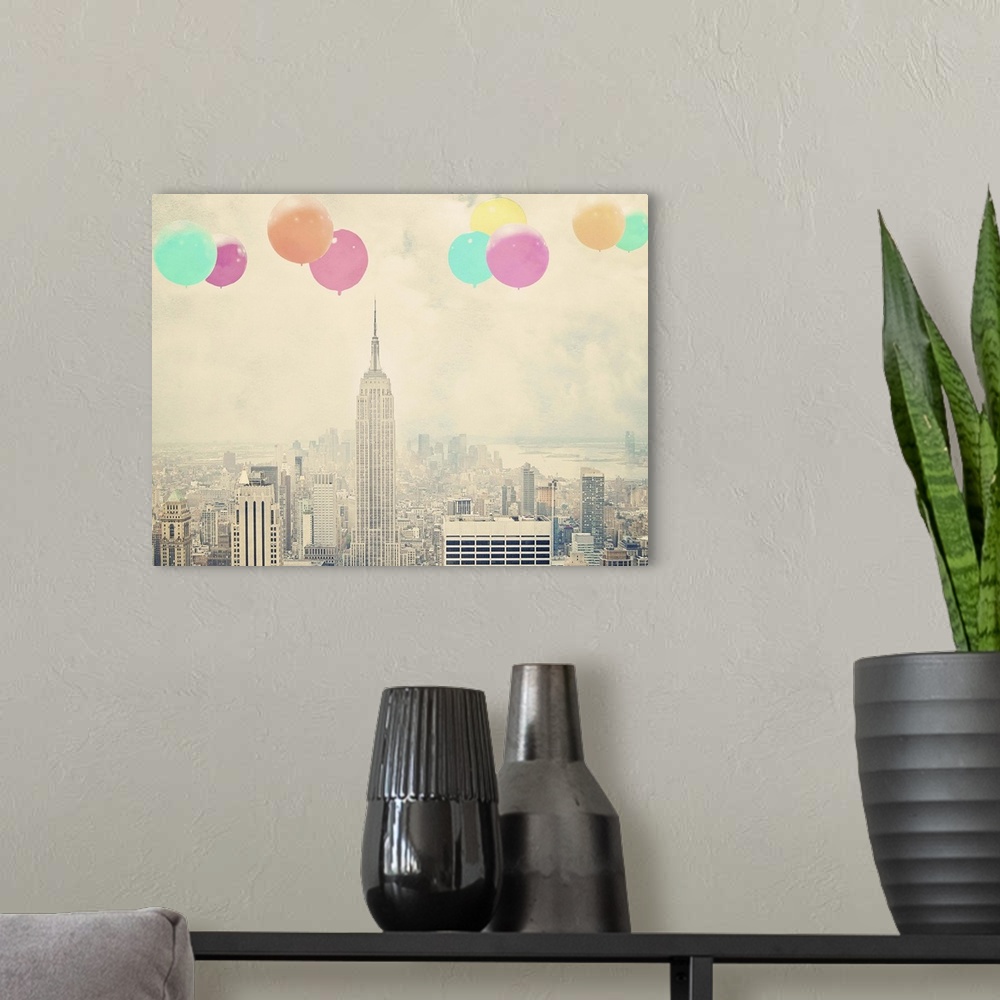 A modern room featuring Artistically filtered photograph of the Empire state building in NYC, with bright balloons floati...
