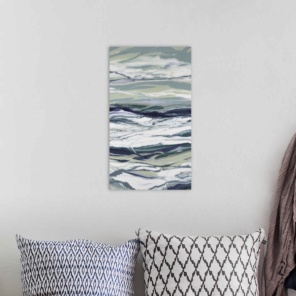 A bohemian room featuring A cool toned, marble-like abstract painting that represents the ocean.