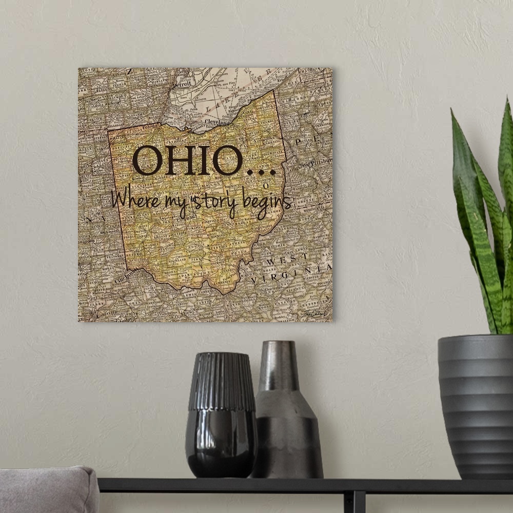 A modern room featuring Black text over a map of the state of Ohio.