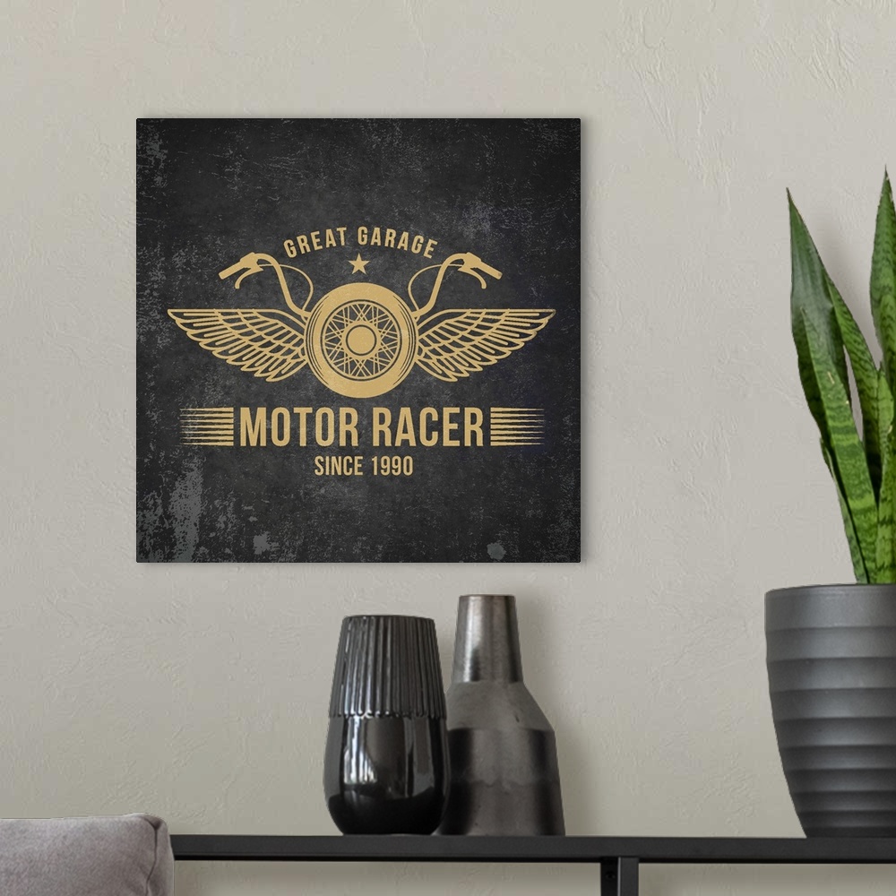 A modern room featuring Gold and black garage sign with a motorcycle and wings design.