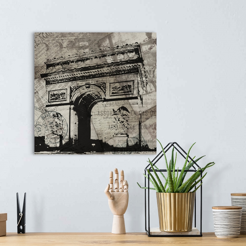 A bohemian room featuring Contemporary artwork of the Arc de Triomphe against travel and postage documentation in black and...