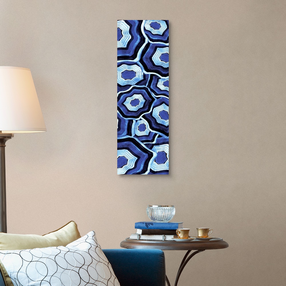 A traditional room featuring Vertical artwork of an assortment of blue ringed agate stones.