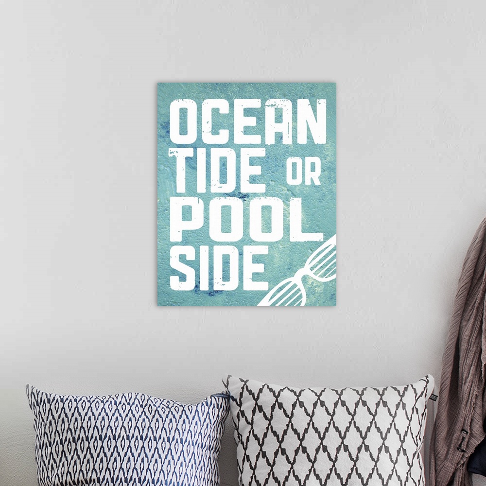 A bohemian room featuring The words "Ocean tide or pool side" on a turquoise textured background.