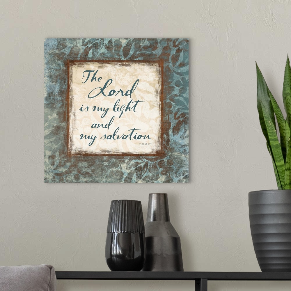 A modern room featuring Scripture artwork with "Psalm 27:1" from the bible, surrounded by a floral pattern.