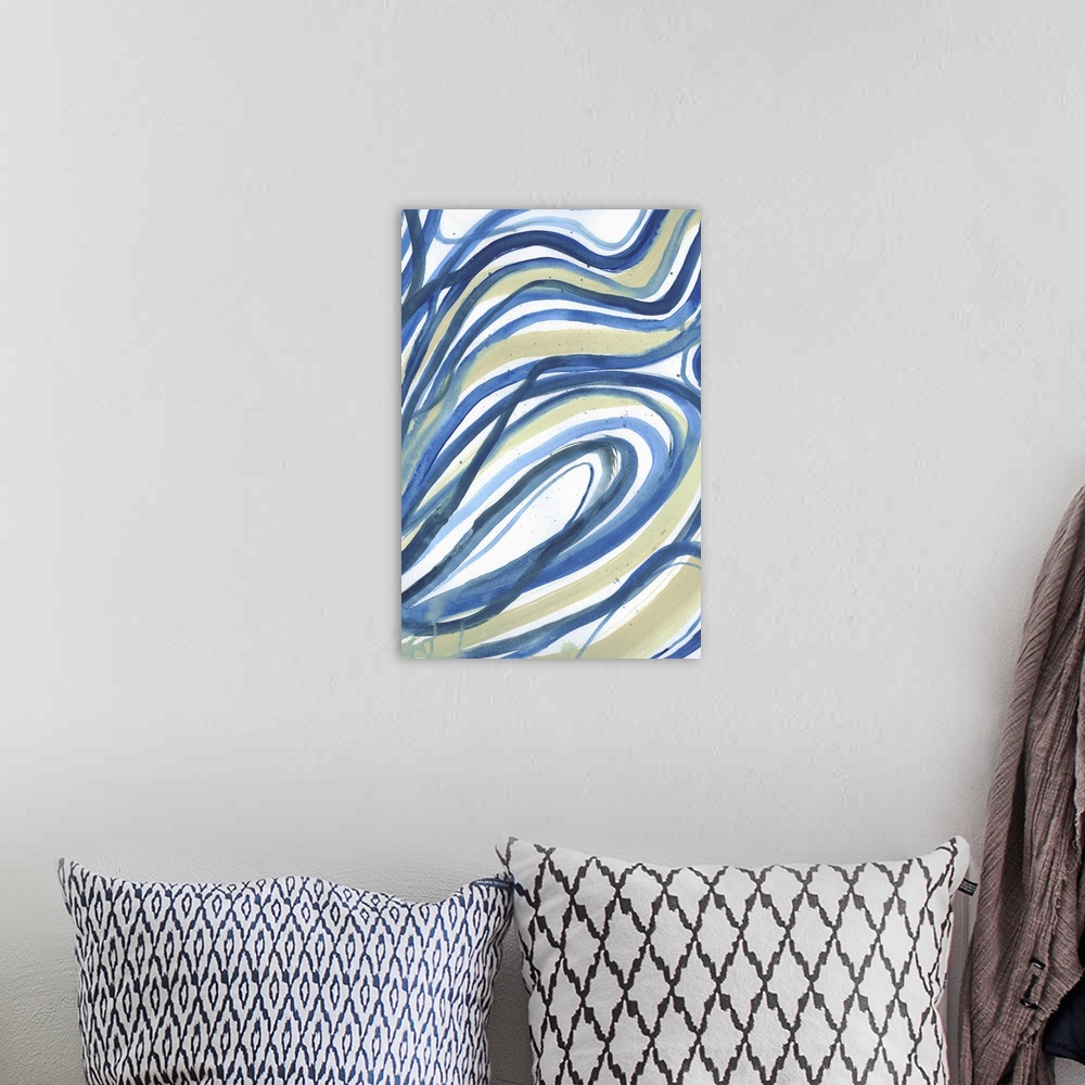 A bohemian room featuring abstract painting using blues and greens in swirling wave like patterns.
