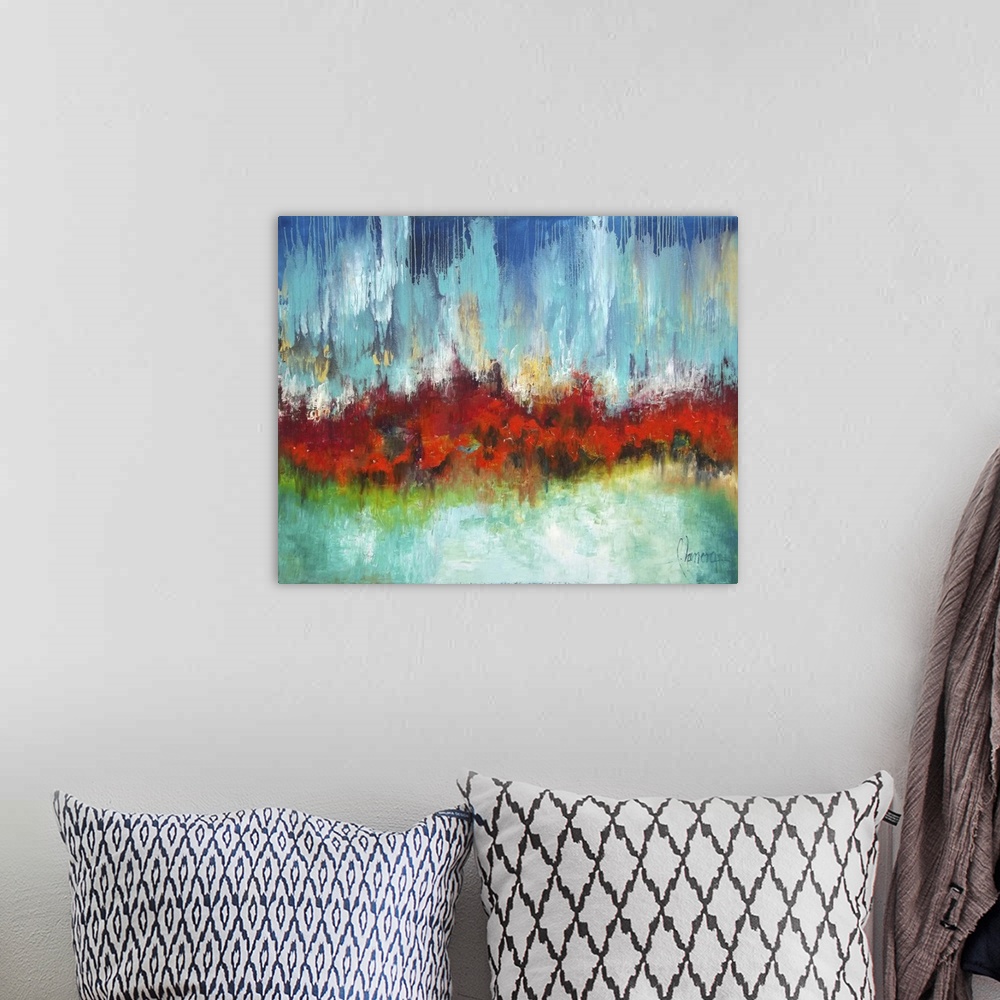 A bohemian room featuring Brightly colored contemporary abstract painting with heavy texture.