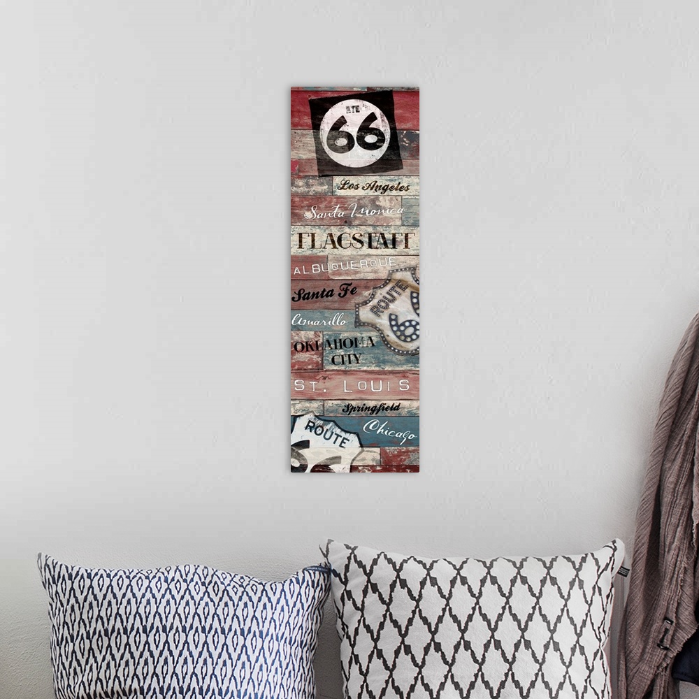 A bohemian room featuring Vertical artwork depicting "route 66" signs with city names.