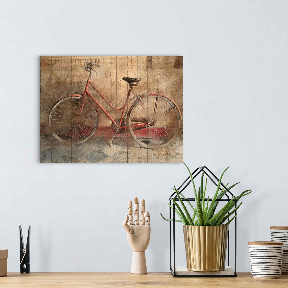 A bohemian room featuring An old bicycle leaning against a wall in low light.