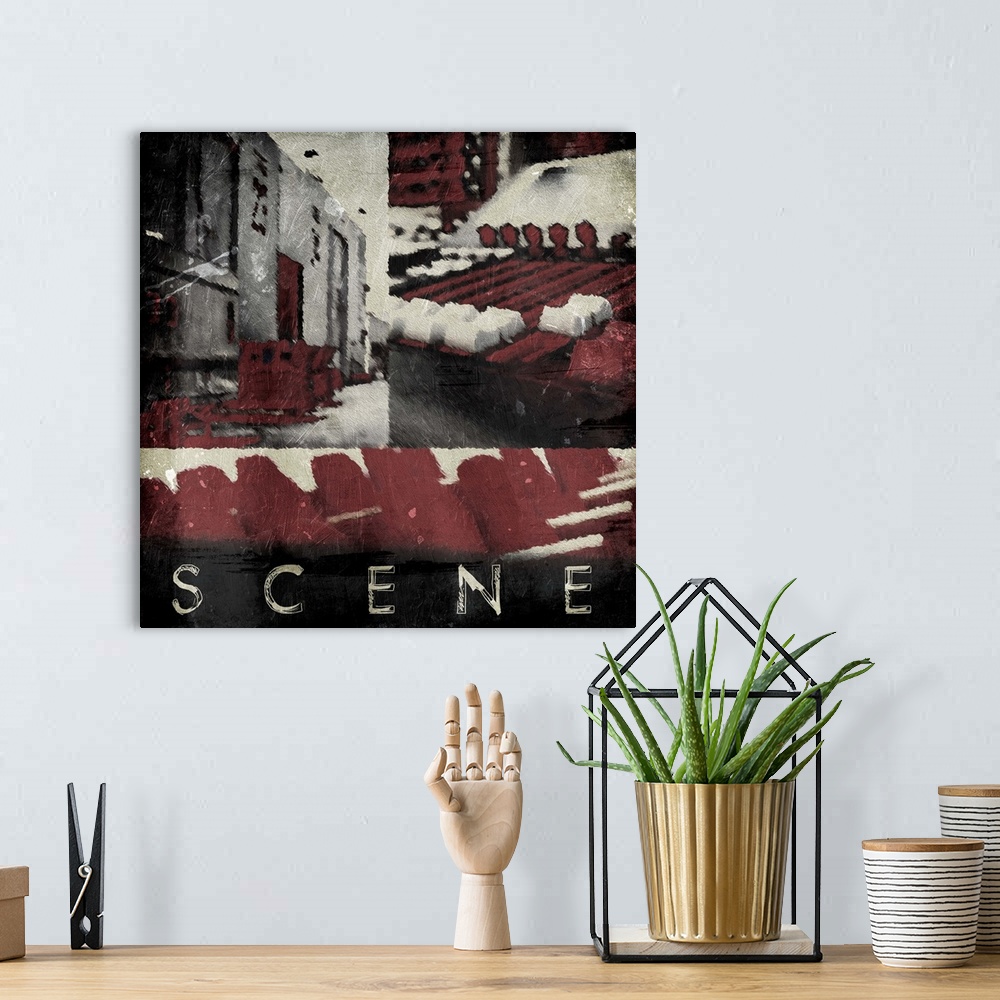 A bohemian room featuring A vintage square theater art piece with the word ?Scene? at painted the bottom.�