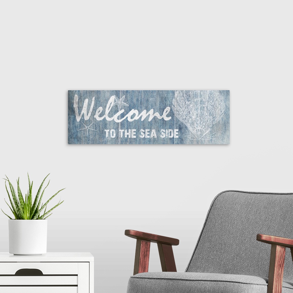 A modern room featuring "Welcome to the Sea Side"