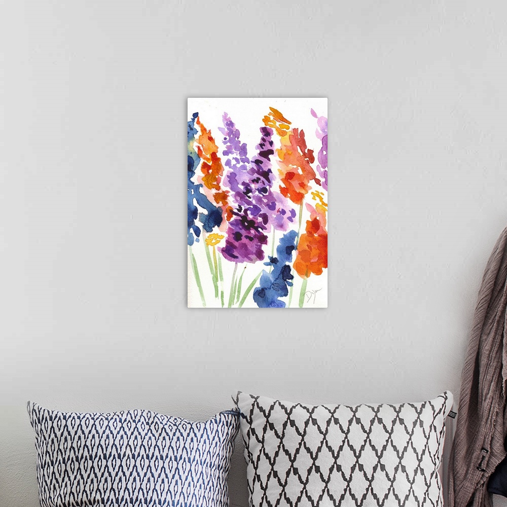 A bohemian room featuring Watercolor painting of brightly colored blooming flowers against a white background.