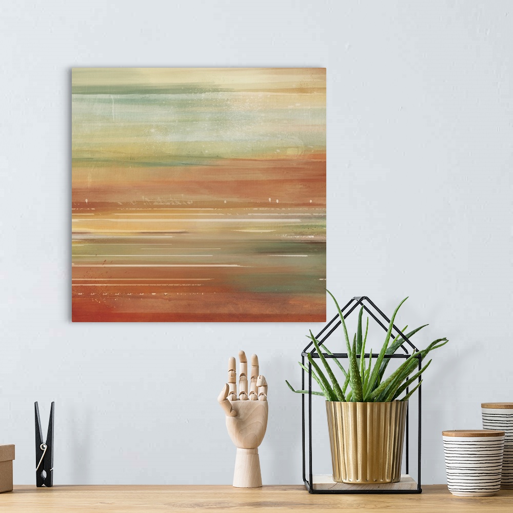 A bohemian room featuring Abstract contemporary painting with warm and cool tones moving across the image.