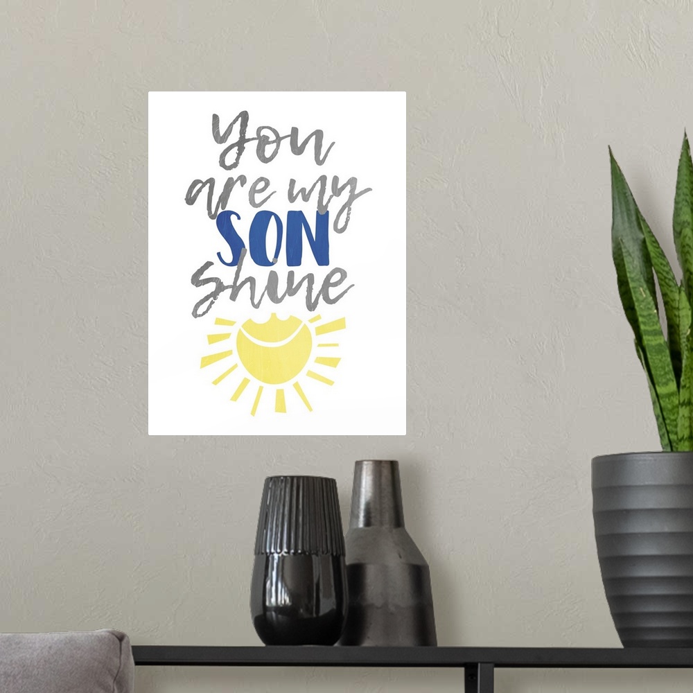 A modern room featuring Children's typography artwork with a sunshine design, for a boy's room.