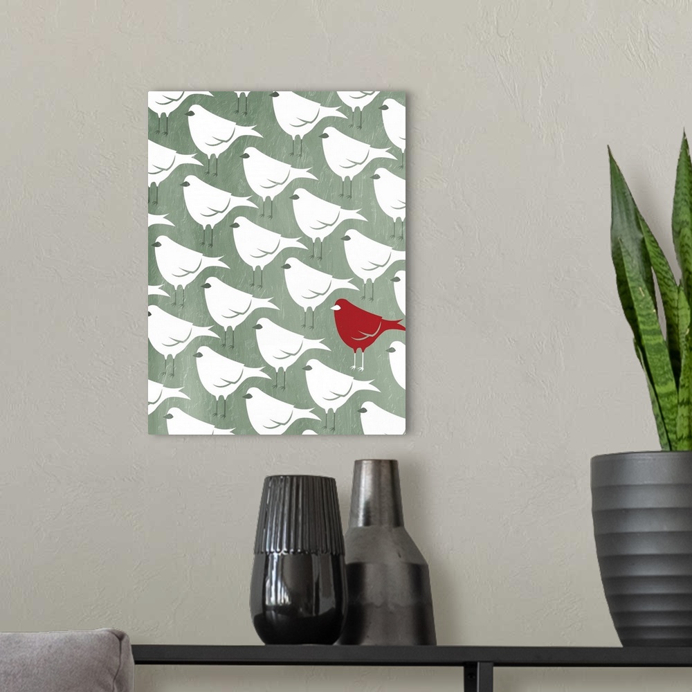 A modern room featuring A pattern of white birds on a sea foam green background with one red bird in the bottom right cor...