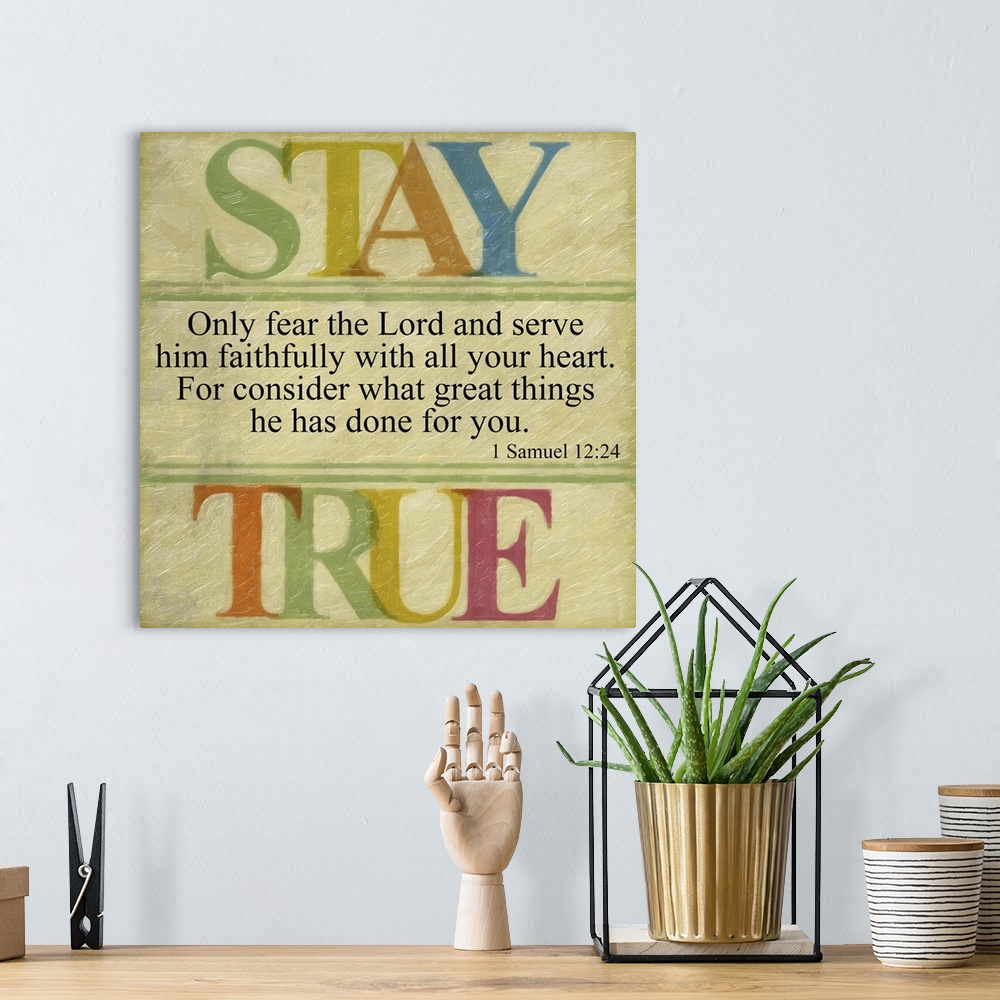 A bohemian room featuring Bible verse I Samuel 12:24 framed by letters in rainbow colors.