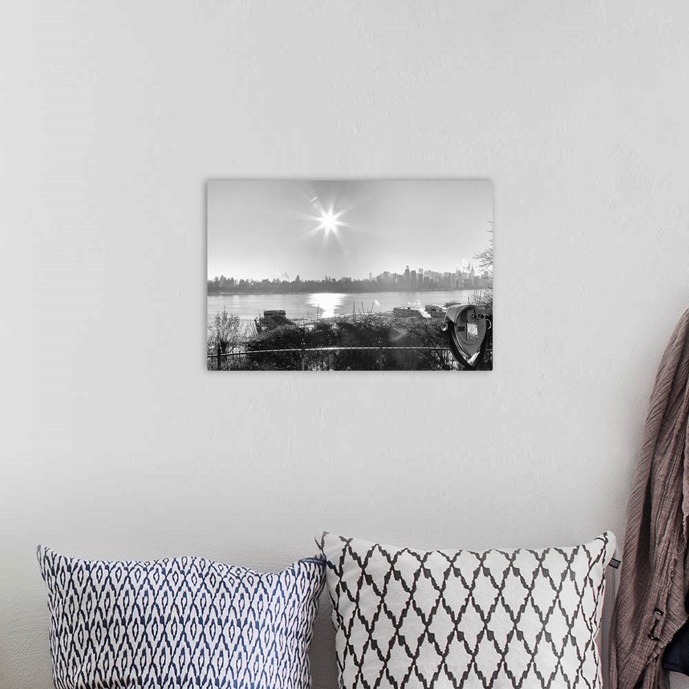 A bohemian room featuring Black and white photograph of the New York City skyline.