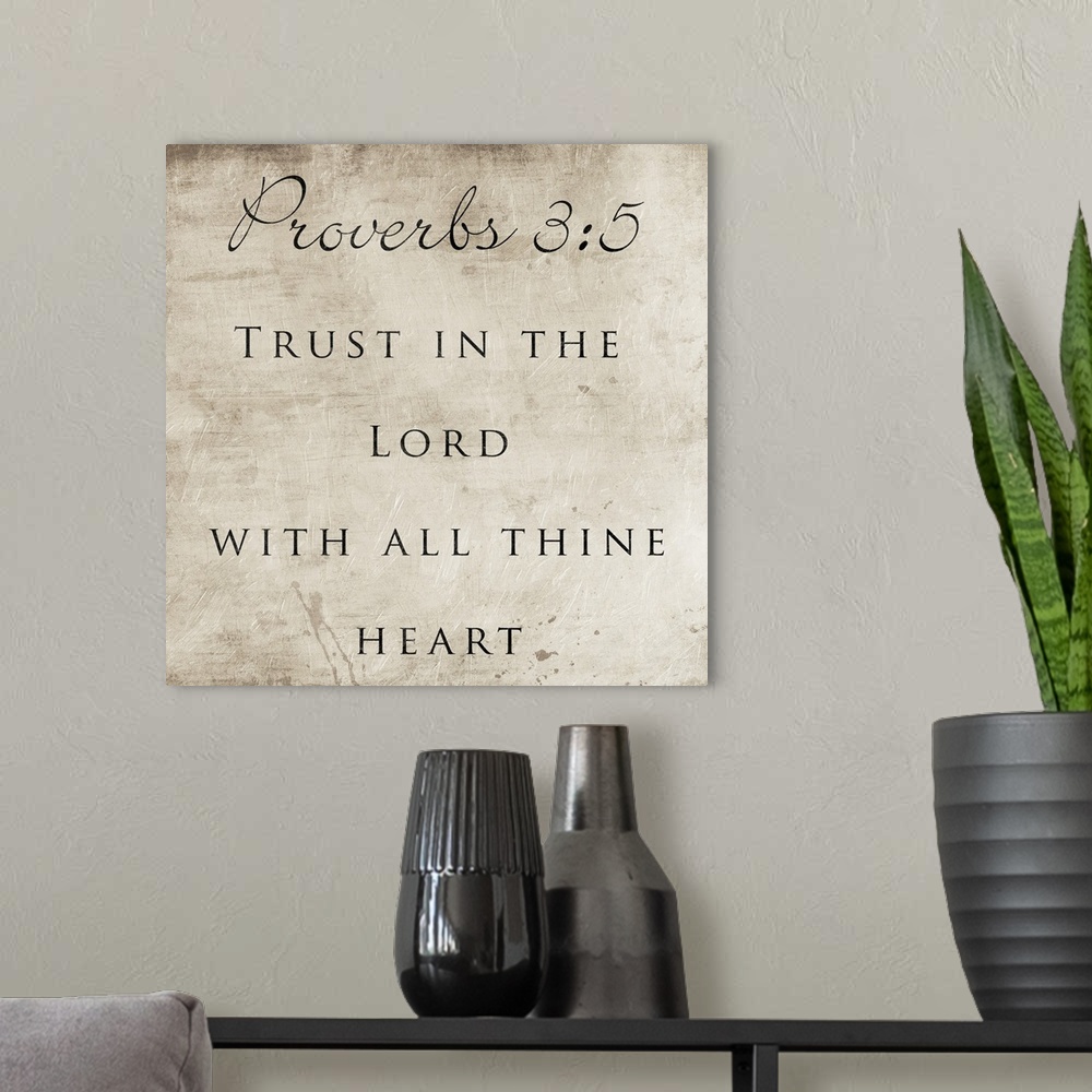 A modern room featuring Typography art of the Bible verse Proverbs 3:5.