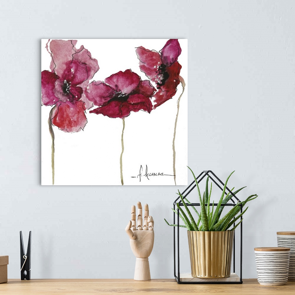 A bohemian room featuring Watercolor painting of three red poppy flowers with long stems.