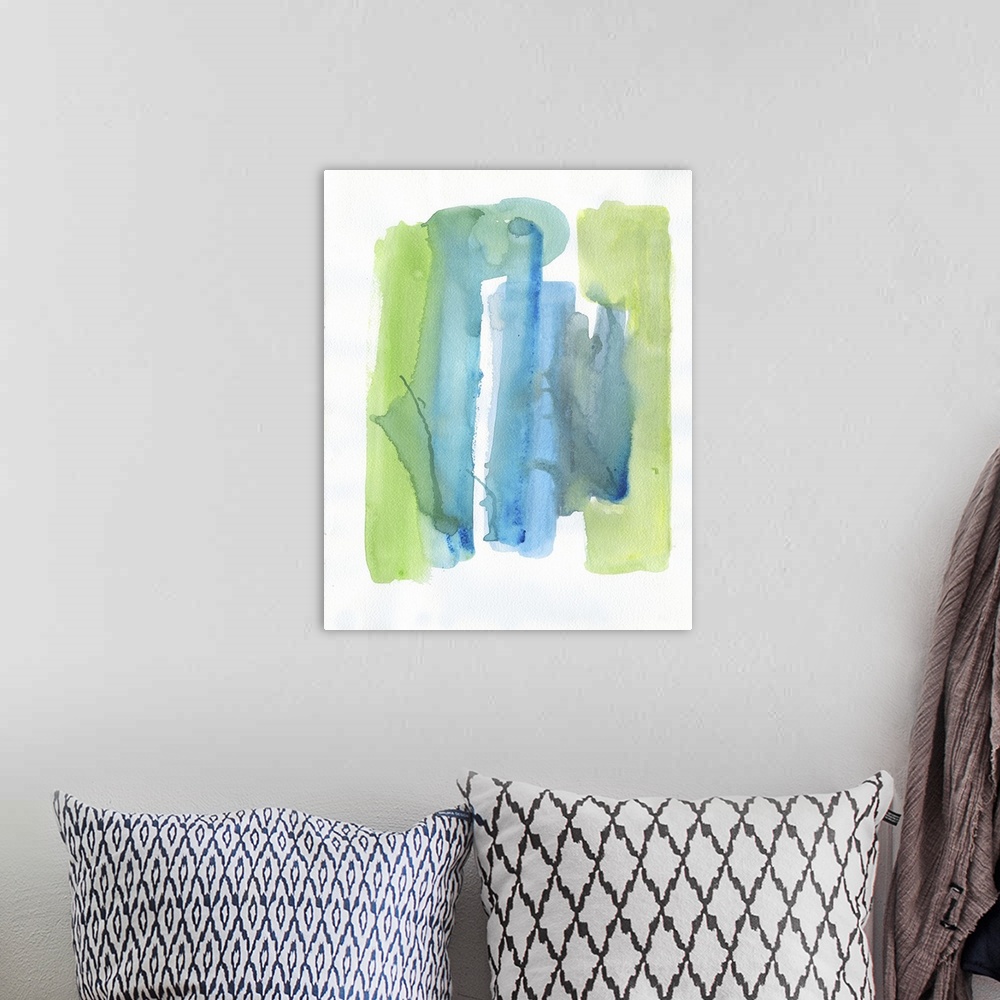 A bohemian room featuring Watercolor abstract artwork in shades of vivid blue and lime green.
