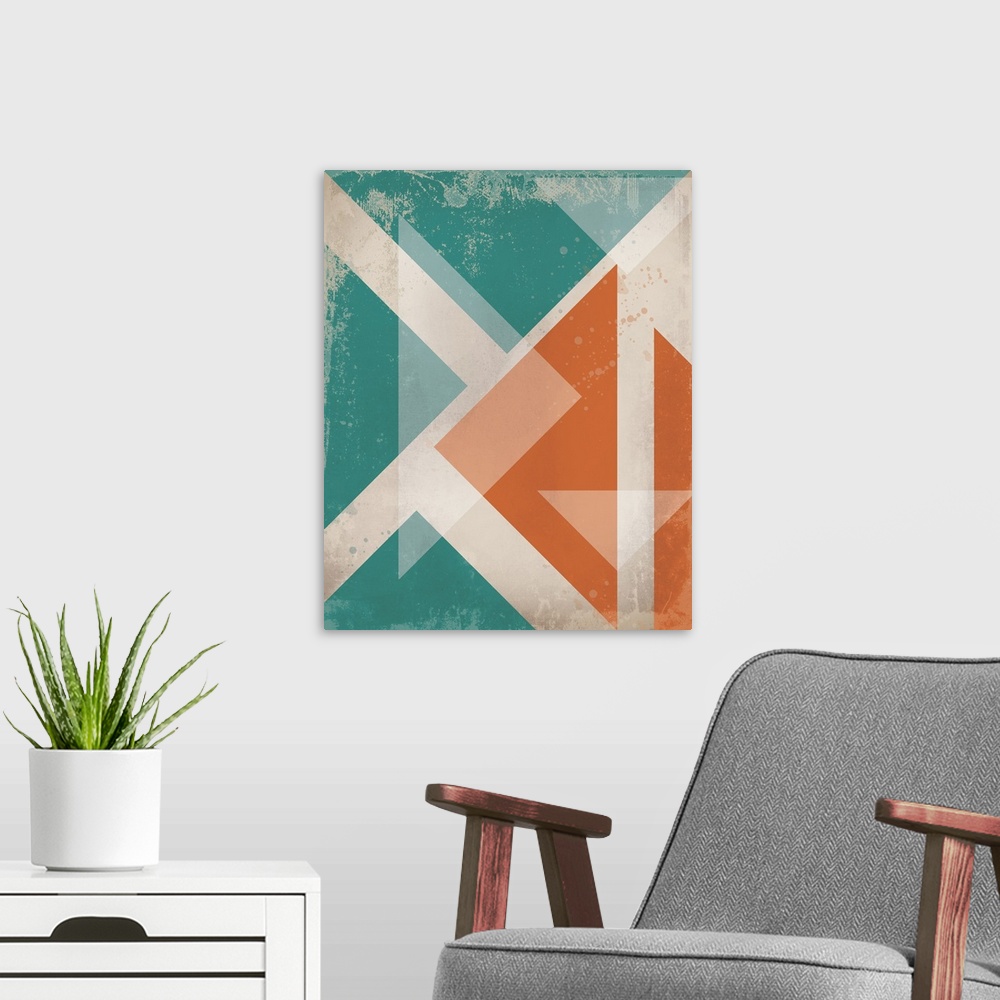 A modern room featuring Contemporary artwork of retro stylized triangles in warm and cool tones over a neutral background.