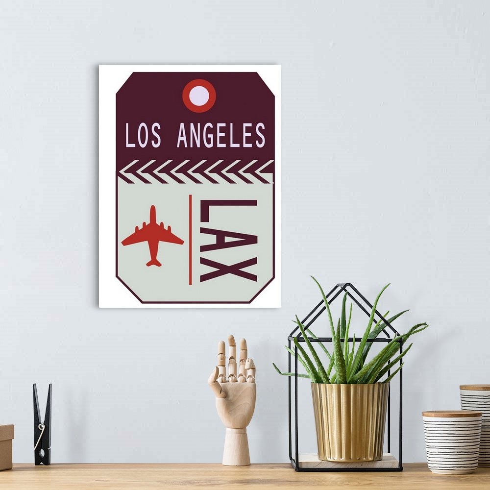 A bohemian room featuring A retro style luggage tag for airline flights to LAX in Los Angeles.