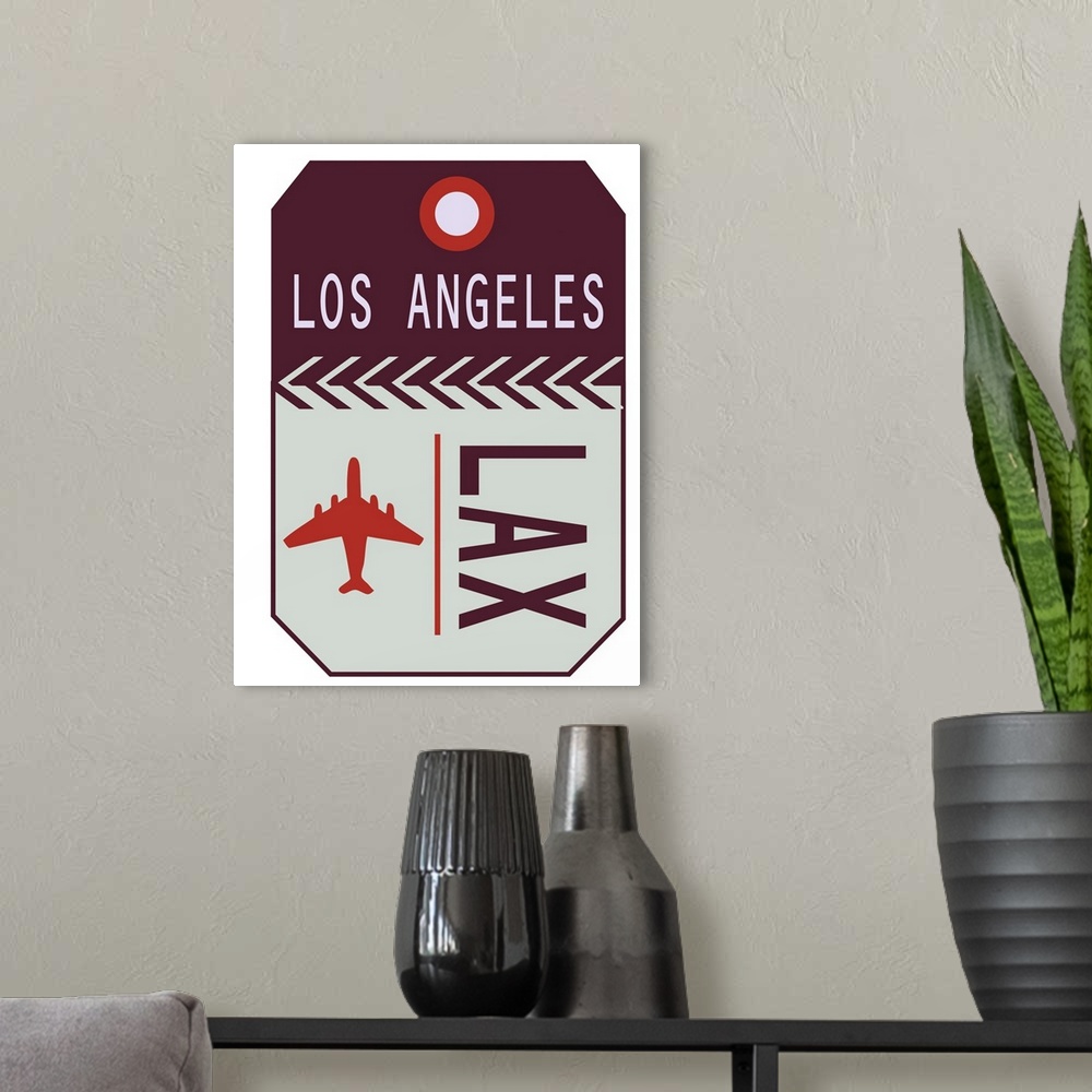 A modern room featuring A retro style luggage tag for airline flights to LAX in Los Angeles.