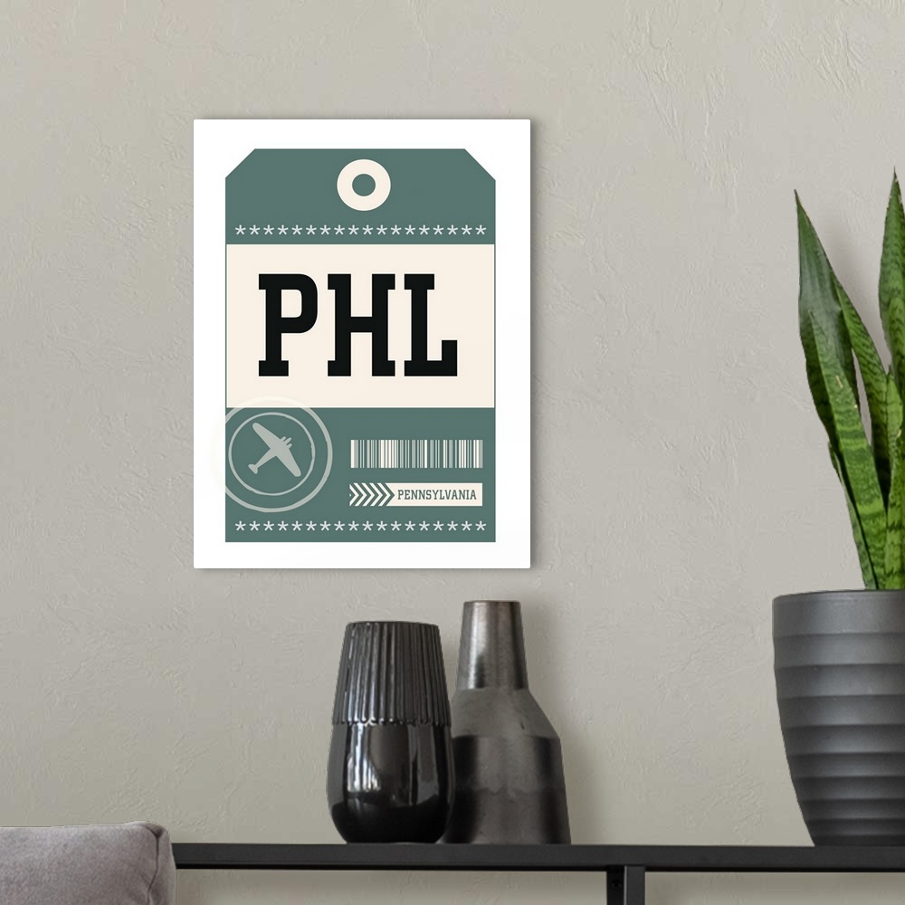 A modern room featuring A retro style luggage tag for airline flights to PHL in Philadelphia.