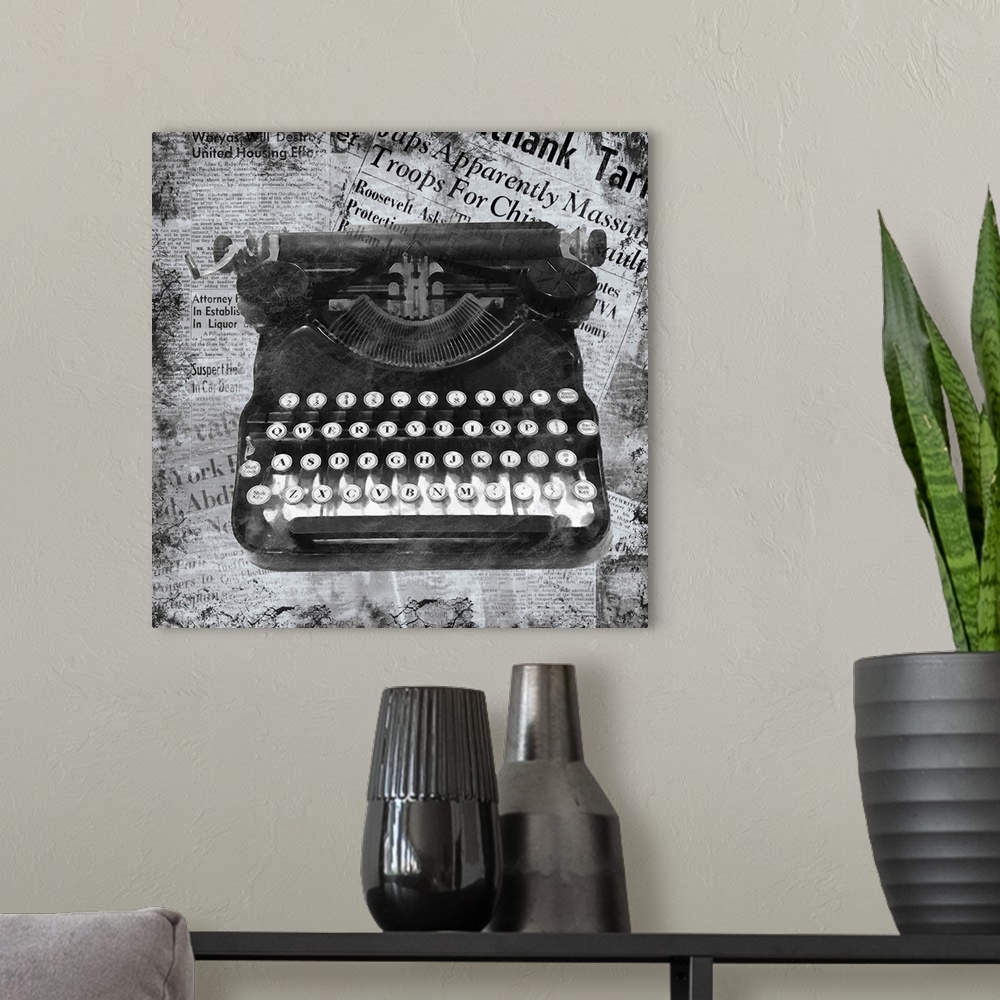 A modern room featuring A black and white image of a vintage typewriter on a newspaper clipping background.