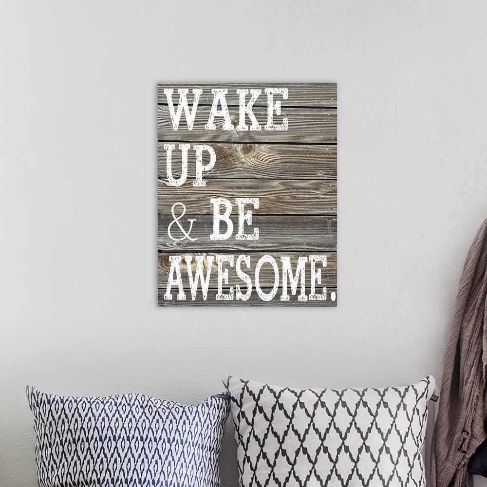 A bohemian room featuring The phrase "Wake Up and Be Awesome." printed on a faux wooden board texture.