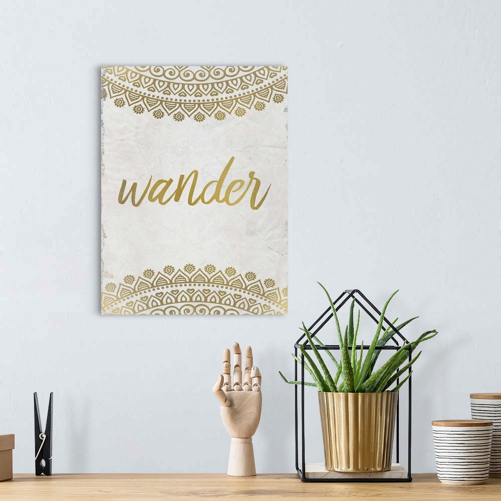 A bohemian room featuring Intricate golden mandala patterns framing the word "Wander."