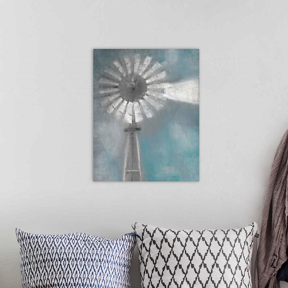A bohemian room featuring An image in shades of gray and blue of a windmill with a textured overlay.