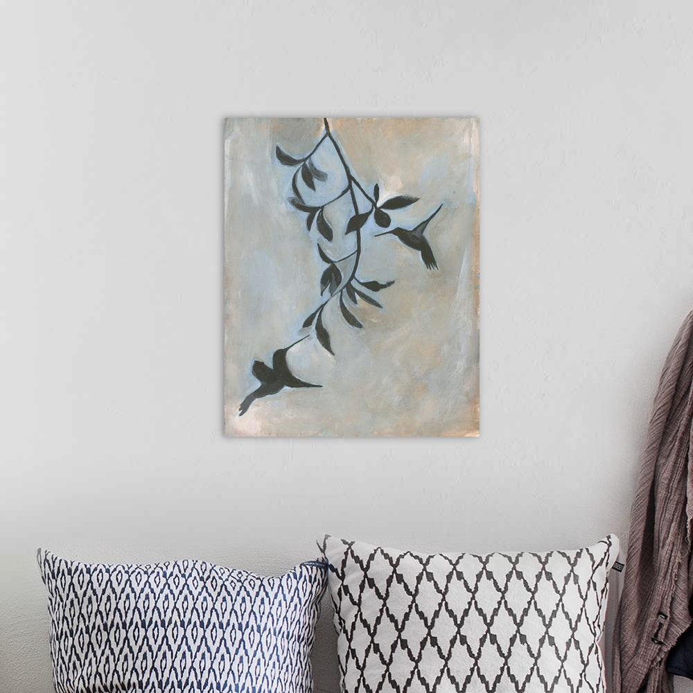 A bohemian room featuring Contemporary artwork of two hummingbirds at a hanging vine.