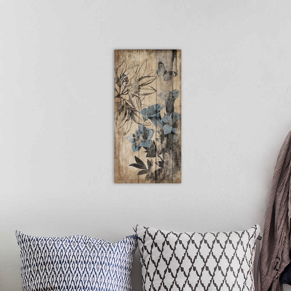 A bohemian room featuring Vertical contemporary artwork of blue flowers appearing to be painted on a wood surface.