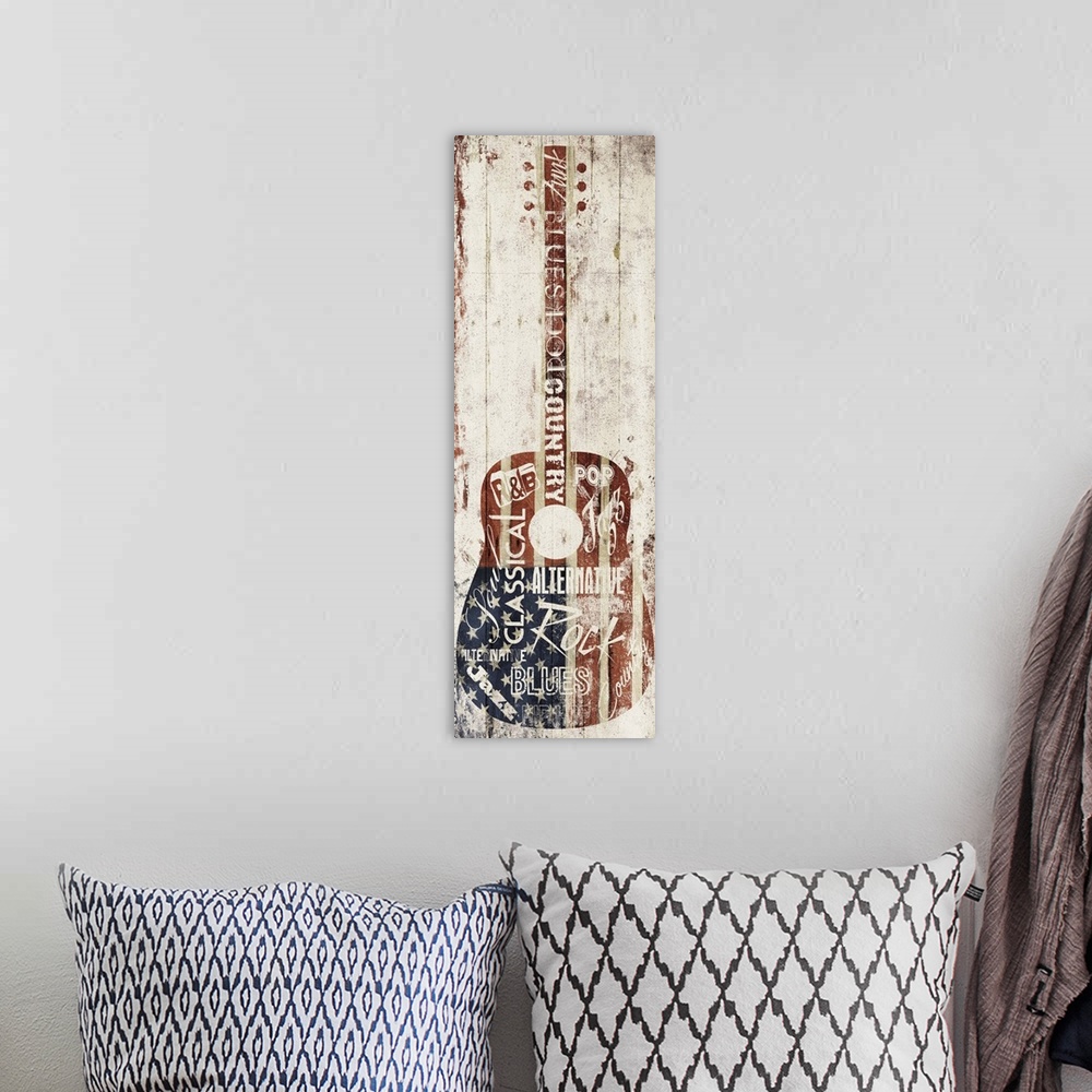 A bohemian room featuring An acoustic guitar embellished with music-themed words and an American Flag pattern.