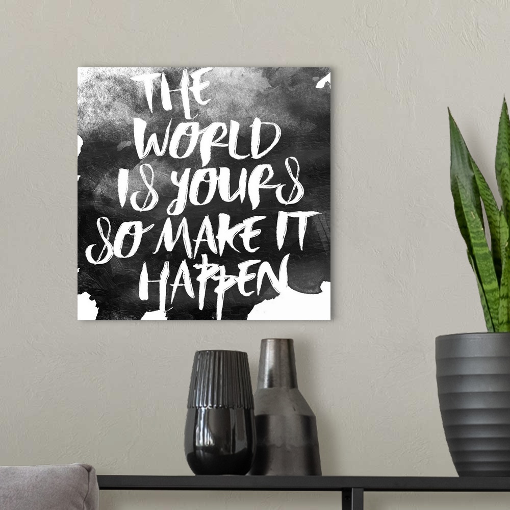 A modern room featuring Inspirational message handwritten in white over black paint.