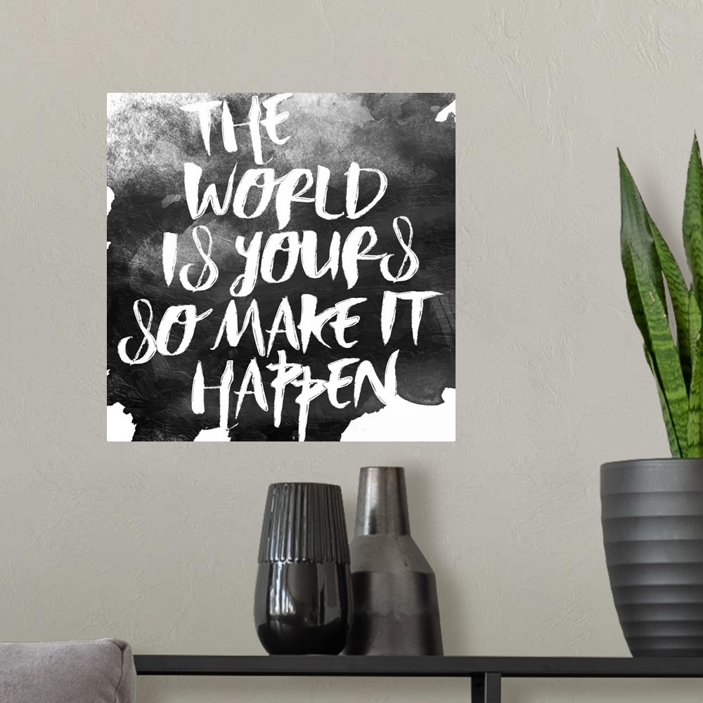 A modern room featuring Inspirational message handwritten in white over black paint.