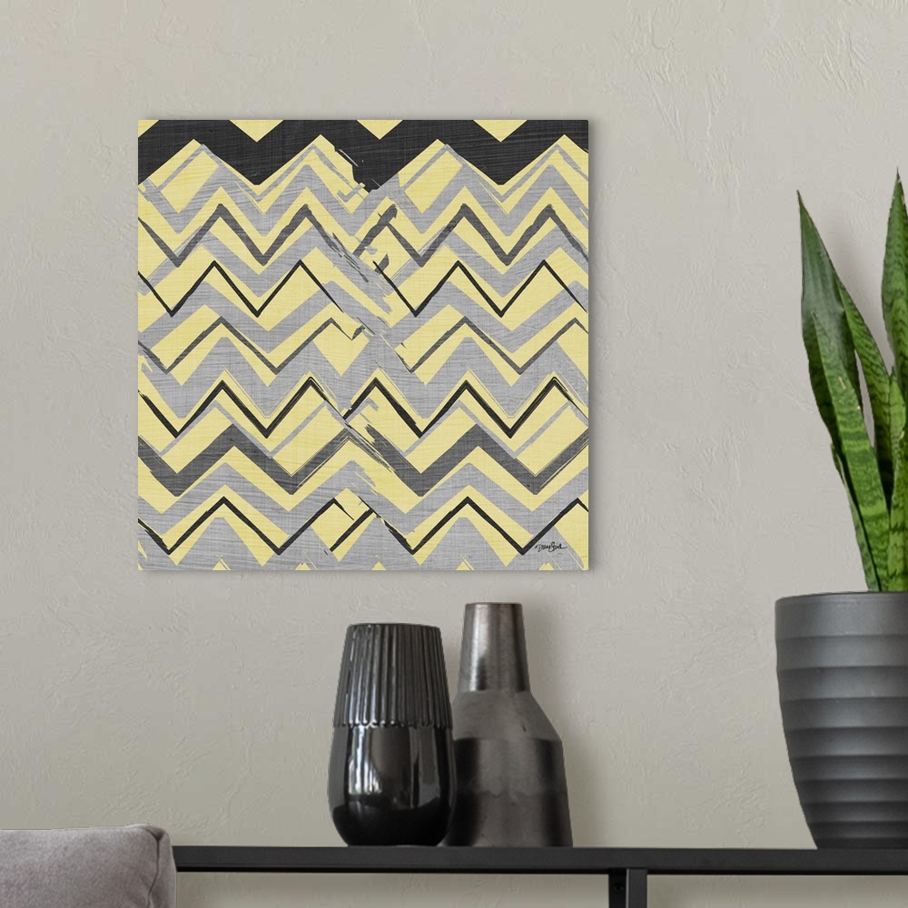 A modern room featuring Contemporary chevron pattern warm tones.