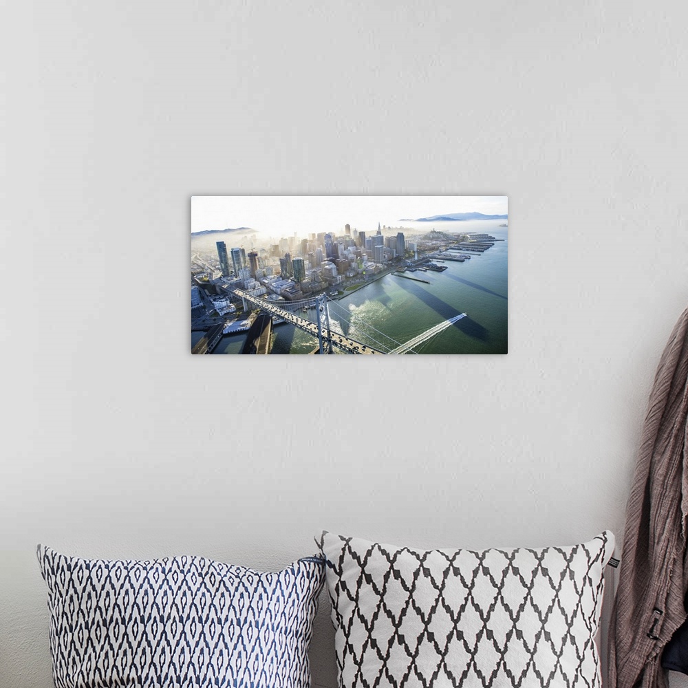 A bohemian room featuring Aerial photograph of the city of San Francisco with the Bay Bridge in the morning.