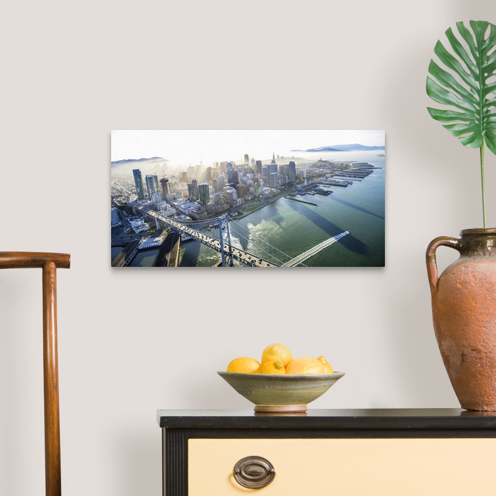 A traditional room featuring Aerial photograph of the city of San Francisco with the Bay Bridge in the morning.