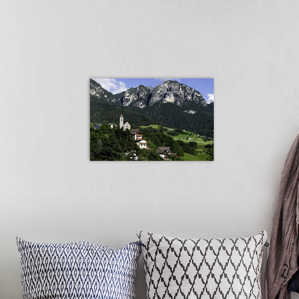 A bohemian room featuring Aerial capture of stunningly beautiful Vols Am Schlern, Northern Italy.