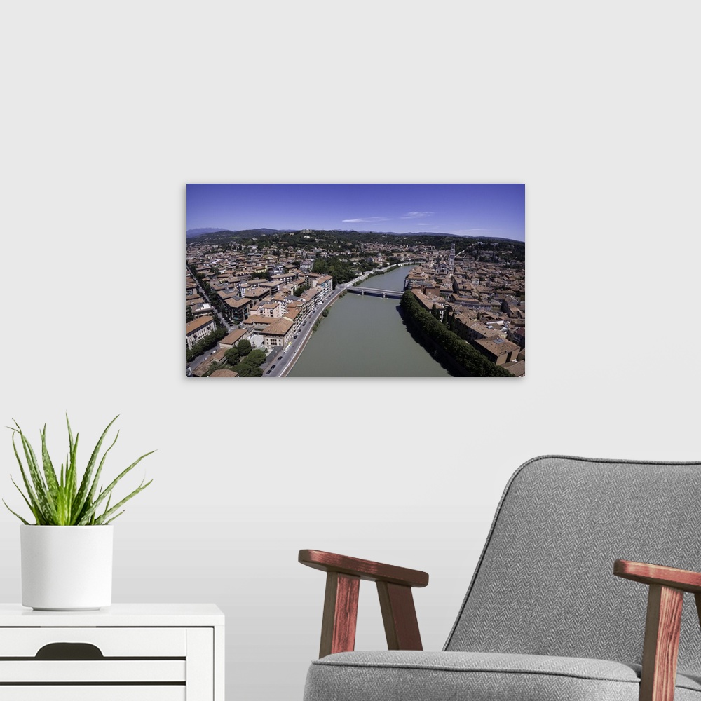 A modern room featuring Aerial image of Verona, Italy